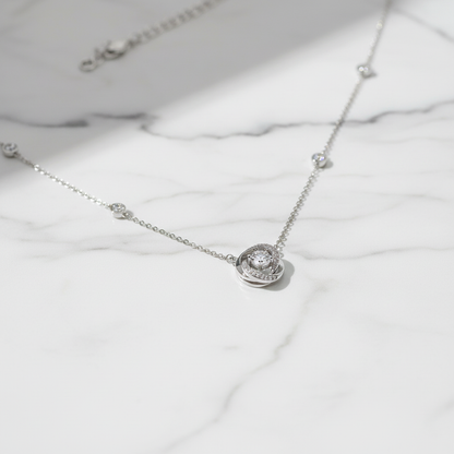 S925 Sterling Silver Möbius Ring Necklace on marble